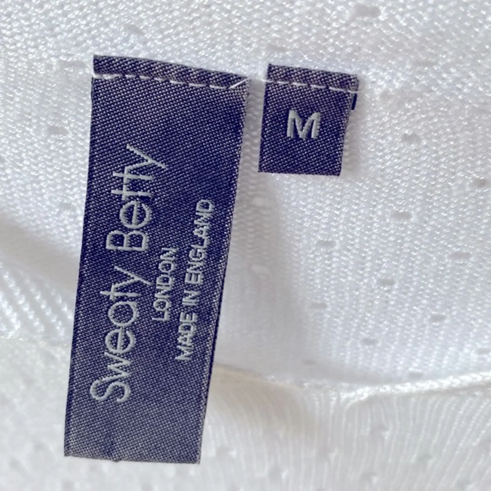 Sweaty Betty Long-sleeve eyelet White hooded top & blue trim on sleeves, Size M - Picture 7 of 10